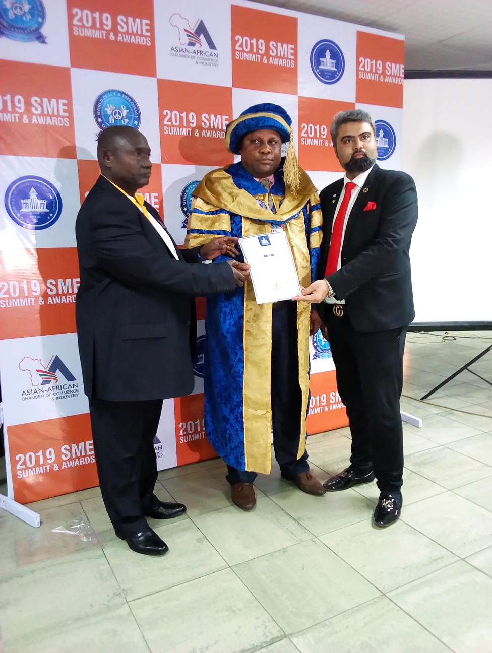 mr-alhaji-chief-tosin-taiwo-leaving-ceremony-with-honorary-doctoral-award-from-the-uet-during-2019-sme-summit-held-in-lagos-on-saturday-27-april-2019